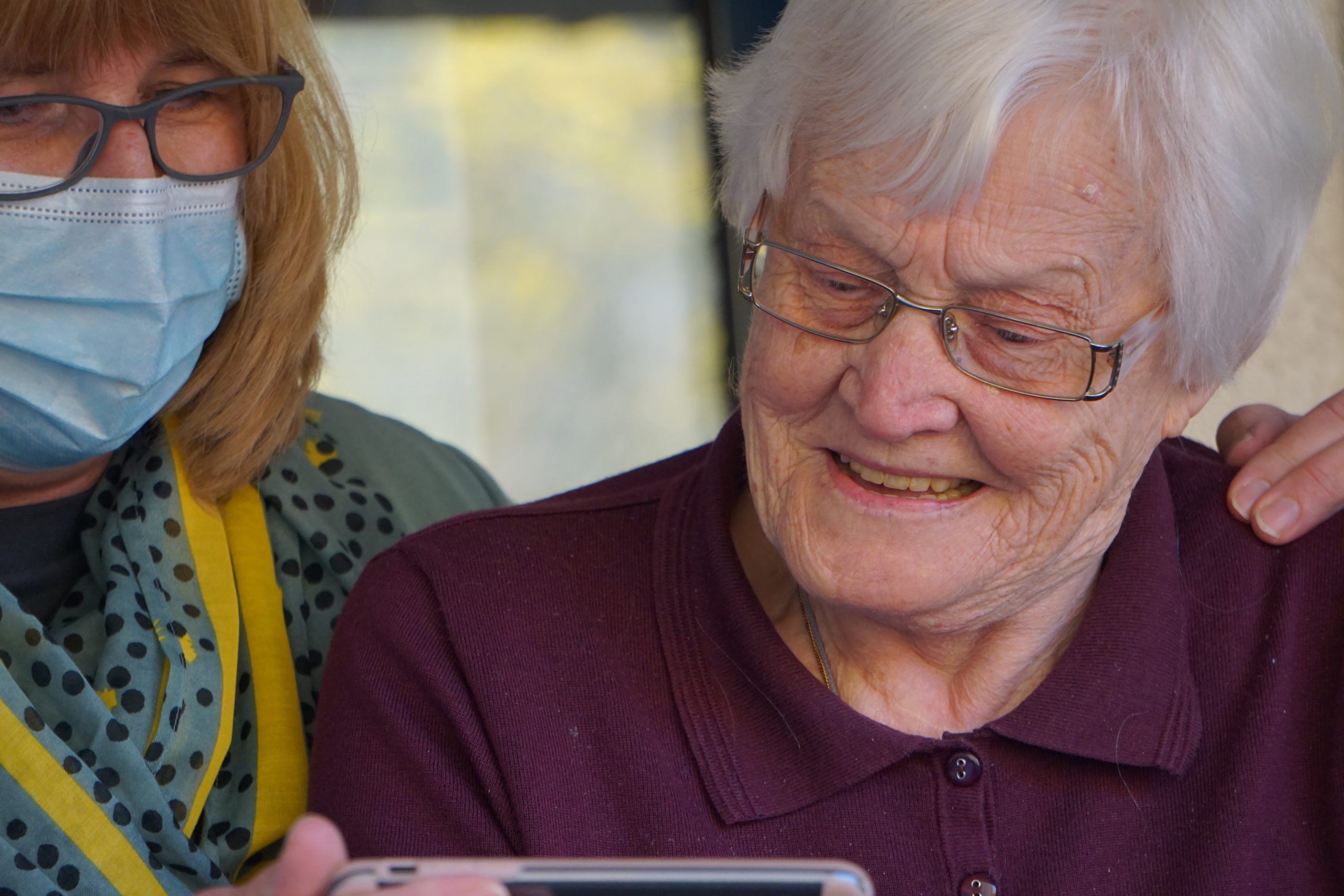 Maple Ridge Pitt Meadows Community Services Senior Navigation and Peer Support Services Program. Senior being helped.